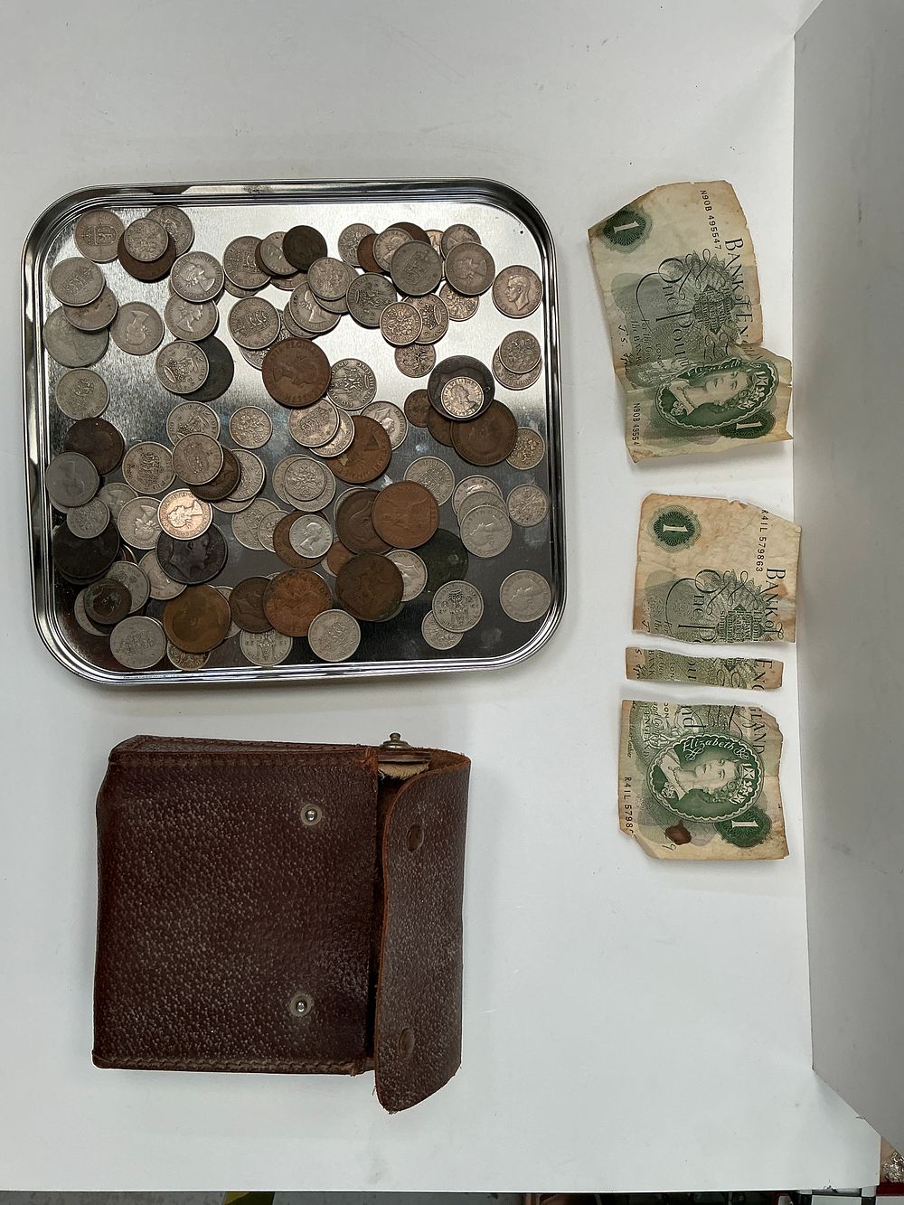 Lot 298: A Collection of UK Banknotes and Pre-Decimal Coinage with a Vintage Leather Wallet