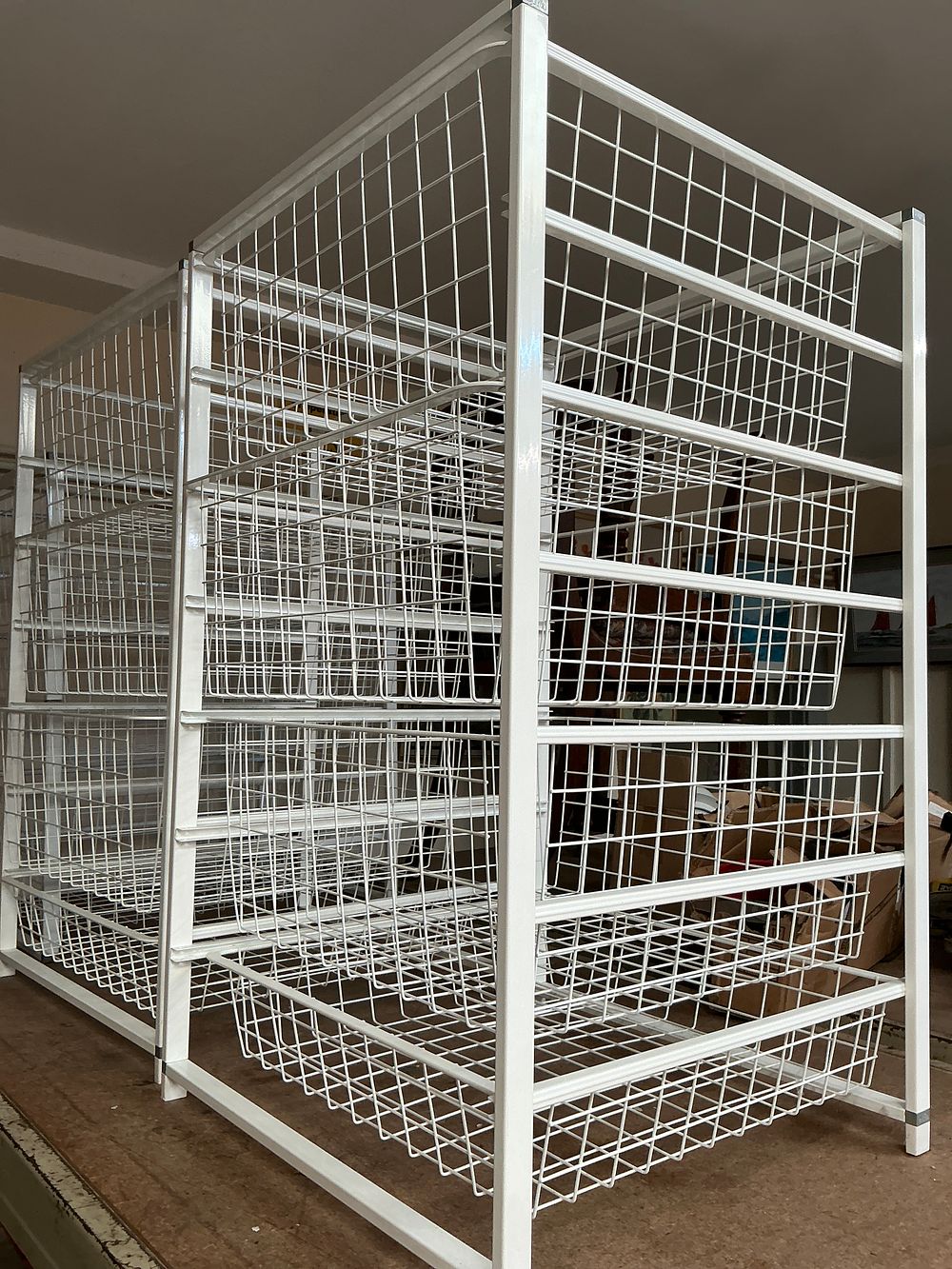 Lot 330: A Modular White Metal Wire Basket Storage System