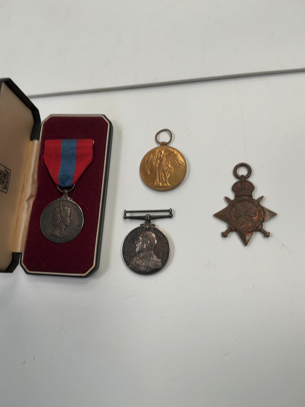 Lot 340: A Group of British Medals awarded to Stoker Petty Officer H. J. Derrick Royal Navy and Henry Albert McLeod