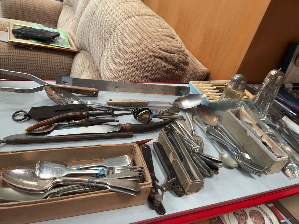 Lot 353: An Assortment of Vintage and Modern Flatware, Carving Tools, and Kitchen Utensils