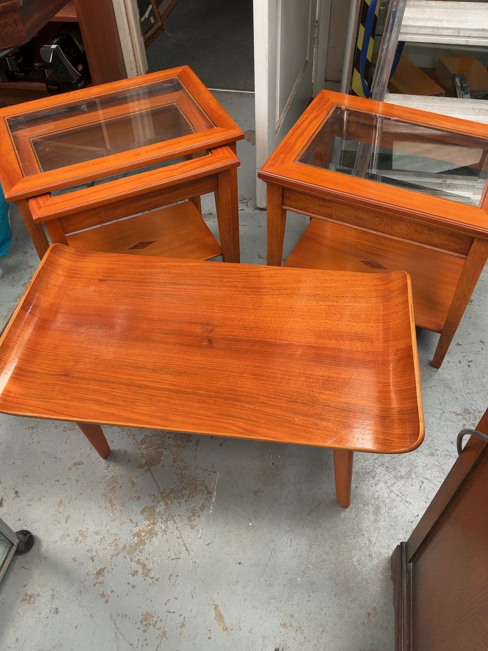 Lot 368: A Group of Mid-Century Modern Teak and Glass Tables