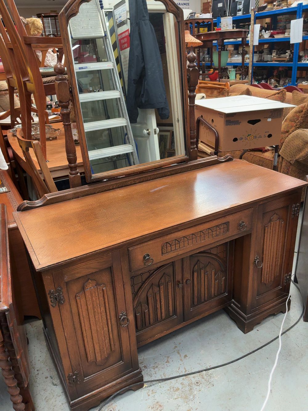 Lot 372: A Wood Bros Old Charm Oak Dressing Table and Bedside Cabinet
