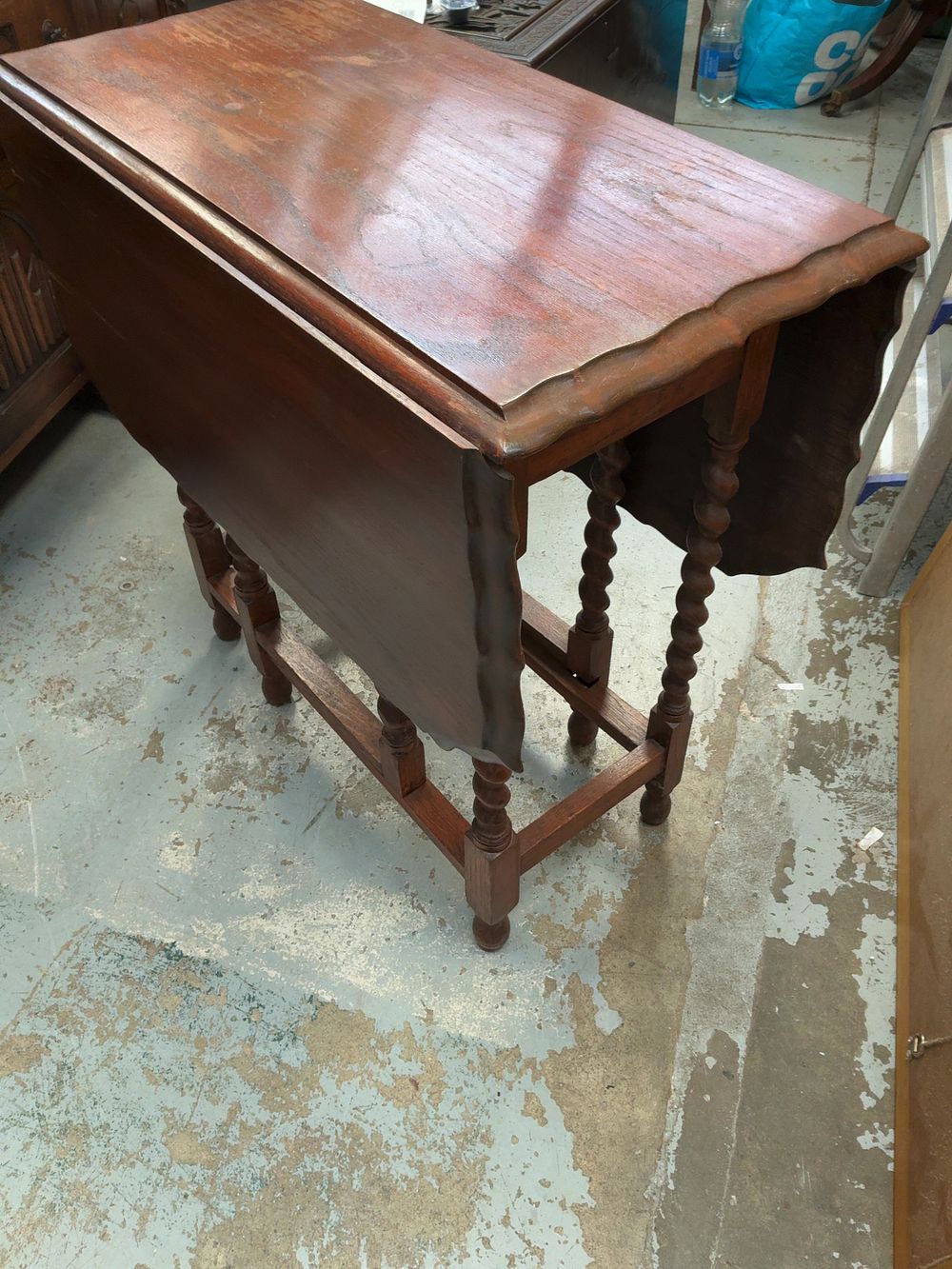 Lot 375: Two Early 20th Century Tables comprising an Oak Barley-Twist Gateleg Table and a Mahogany Inlaid Occasional Table