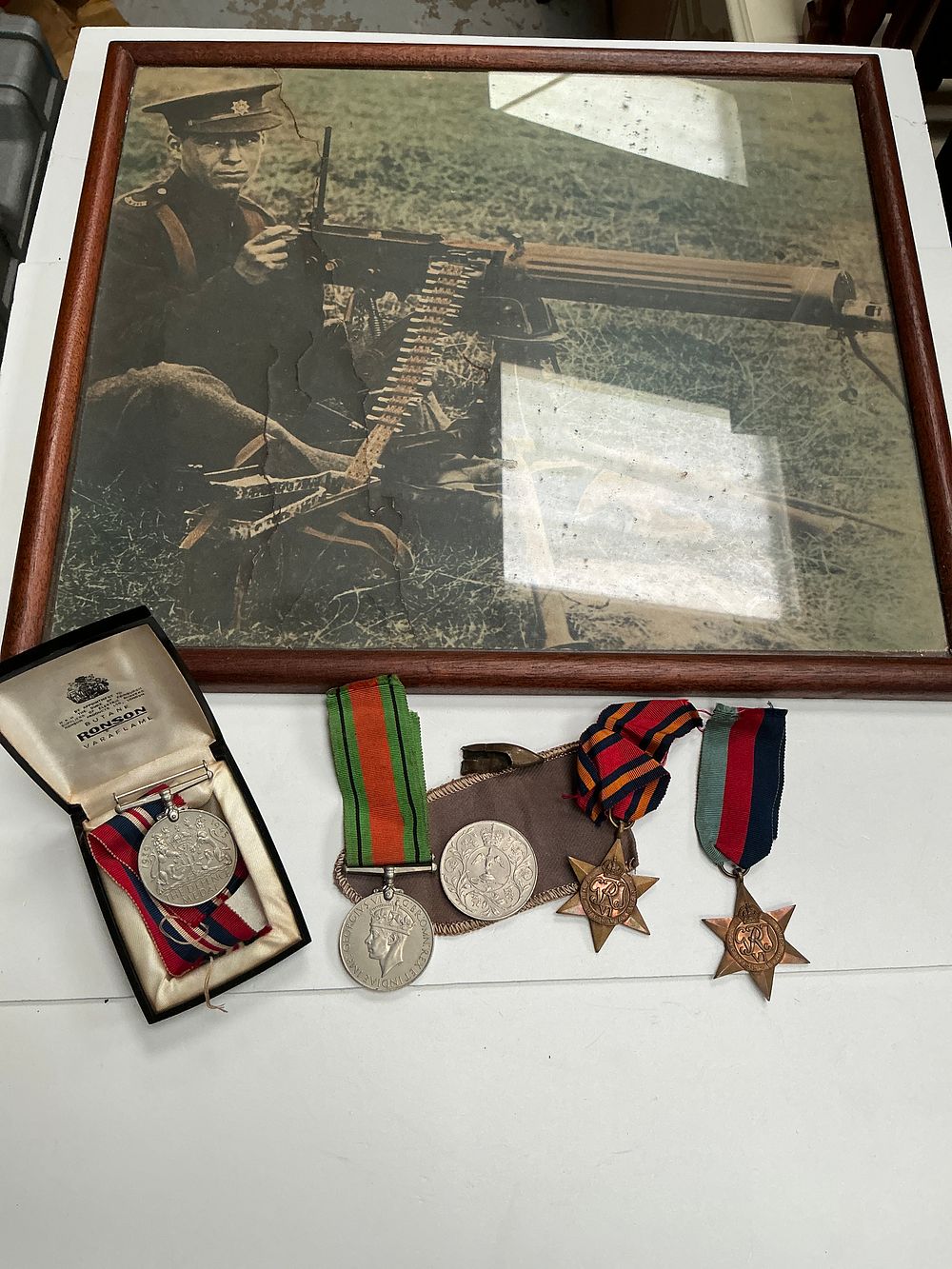 Lot 134: A Group of Second World War British Campaign Medals, Framed Photograph, and Commemorative Items