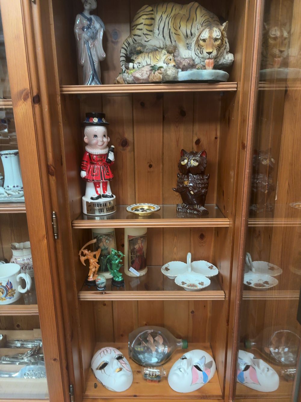Lot 411: An Assortment of 20th Century Decorative Figurines, Ceramics, and Maritime Collectables