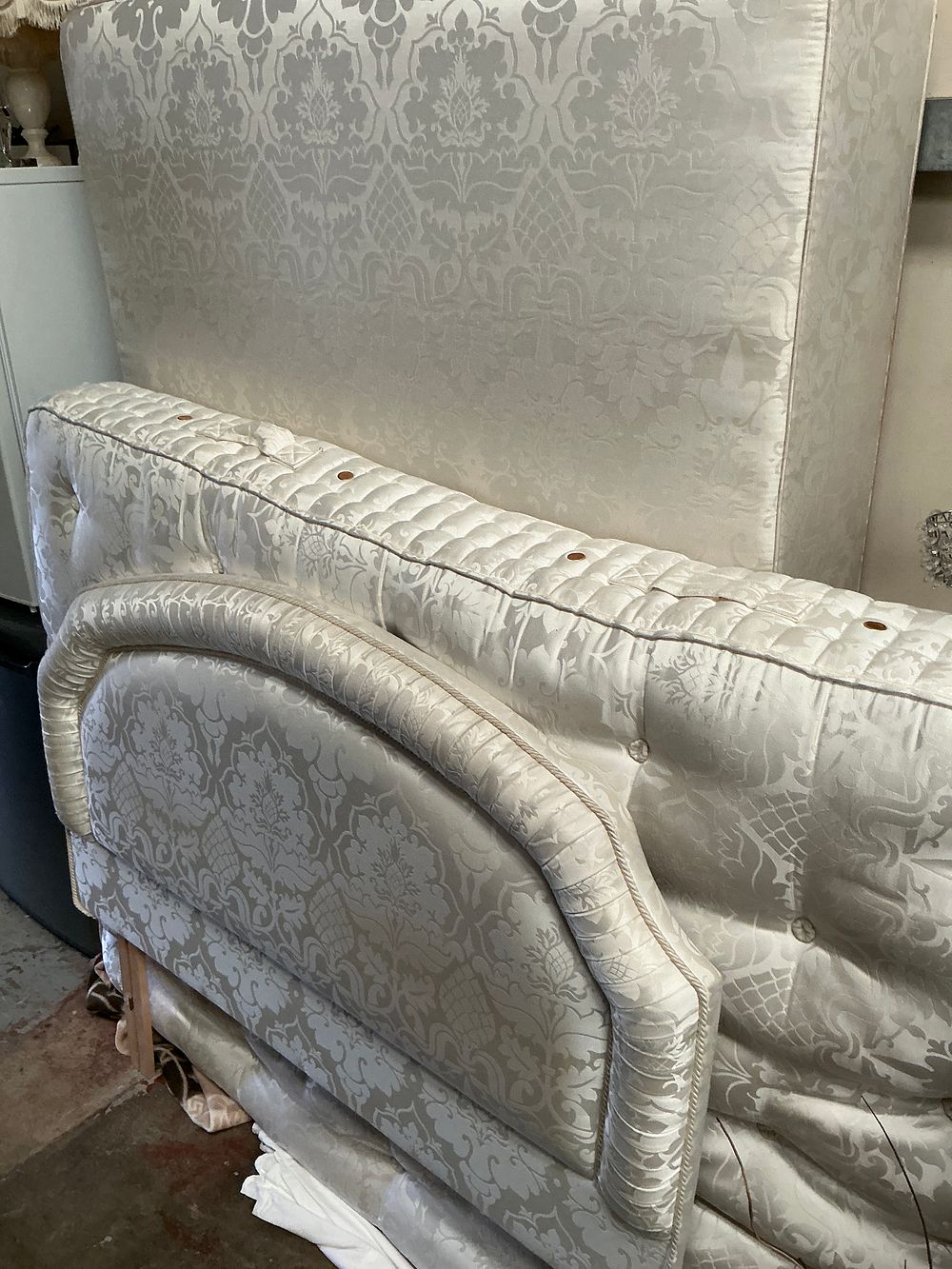Lot 450: A Traditional Upholstered Divan Bed Set and Matching Shaped Headboard in Ivory Damask Fabric