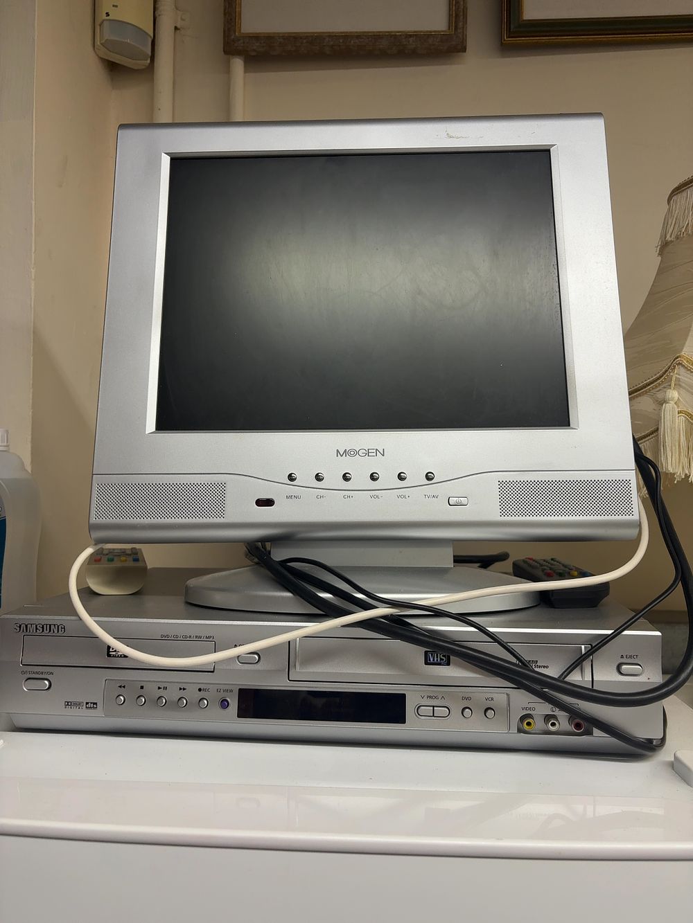 Lot 454: A Samsung SV-DVD440 DVD and VCR Combo Player and a Mogen Flat Panel Monitor