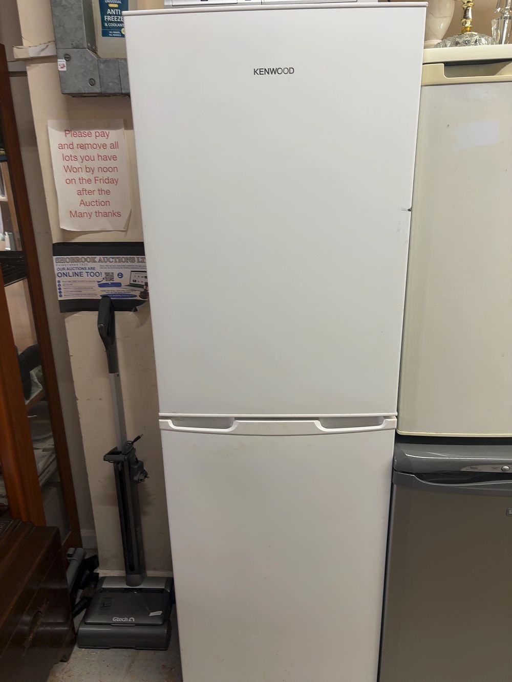 Lot 455: A Kenwood white freestanding fridge freezer