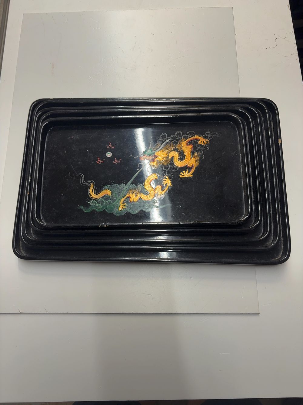 Lot 462: A Set of Chinese Foochow style black lacquer graduated nesting trays