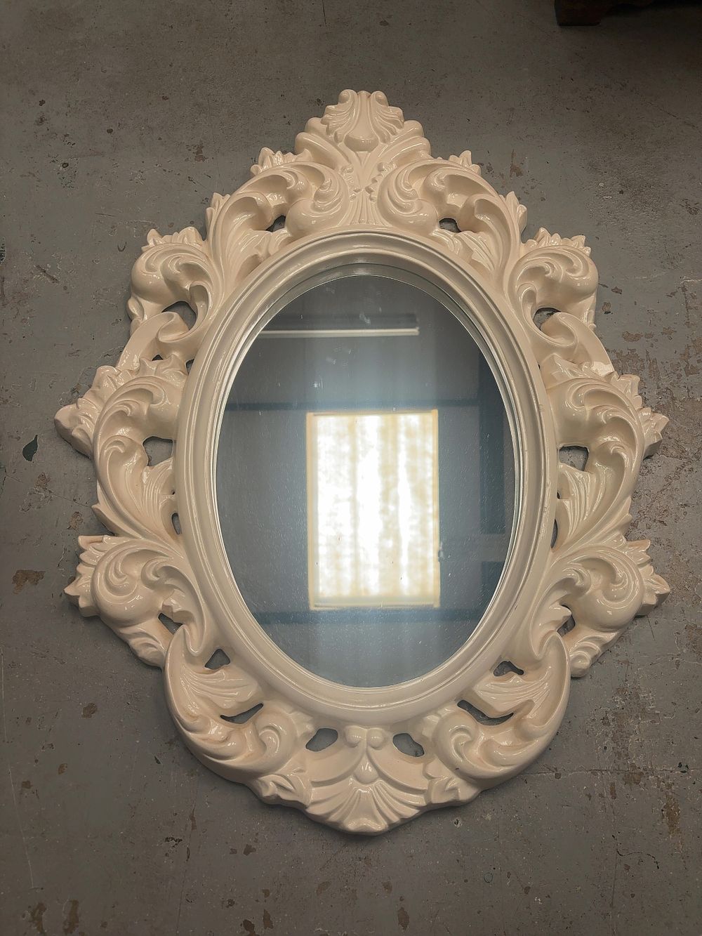 Lot 211: A Contemporary Rococo Style Oval Wall Mirror Retailed by Argos, 2011