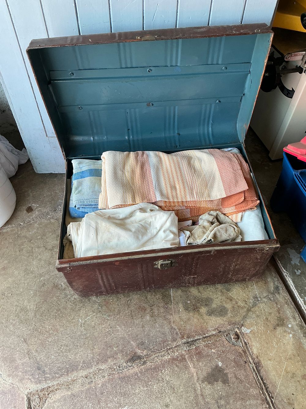 Lot 468: Early 20th Century Metal Clad Dome Top Storage Trunk with Assorted Vintage Linens