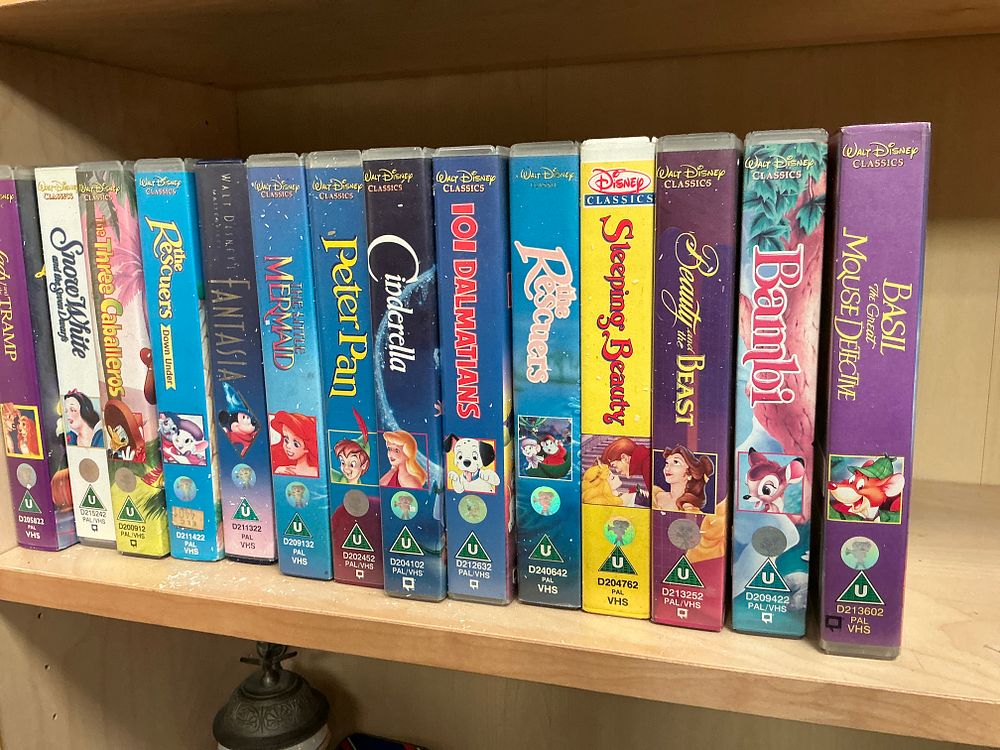 Lot 174: A Collection of Fourteen Walt Disney Classics and Masterpiece Collection VHS Tapes