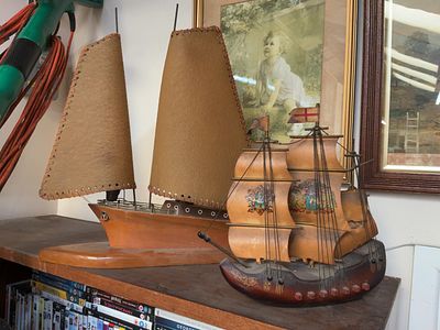 Two Vintage Wooden Model Ship Table Lamps. Two vintage model ship table lamps of contrasting 
