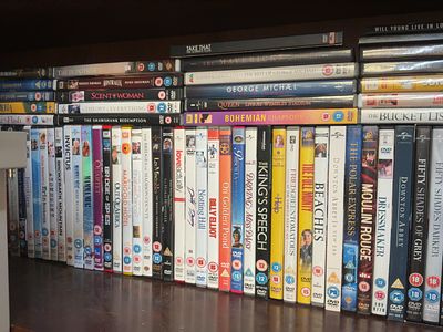 A Collection of Assorted DVD Feature Films and Live Music Performances. A large collection of 