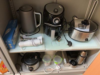 A Collection of Assorted Small Kitchen Appliances and Accessories. An assortment of various 