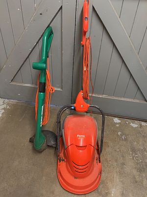 Two Electric Garden Power Tools including a Flymo Mow n Vac and a Black & Decker GL650 Trimmer. T 