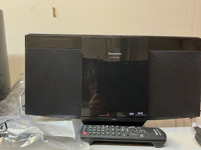 Panasonic SC-HC25DB Compact Stereo System with DAB Radio and iPod Dock. A Panasonic SC-HC25DB 