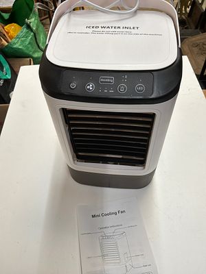 GY-A835 Portable Mini Electric Cooling Fan and Personal Air Cooler. A portable mini electric 