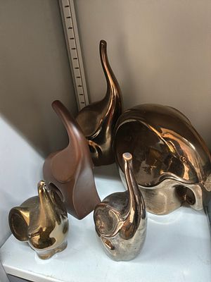 A Collection of Stylised Ceramic Elephant Sculptures. A collection of several stylised 