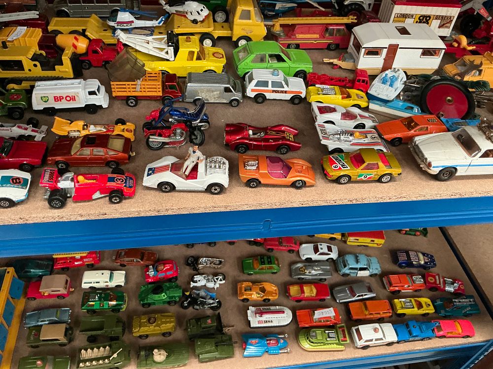 Lot 221: A Large Collection of Vintage Toy Vehicles by Matchbox, Corgi, and Others