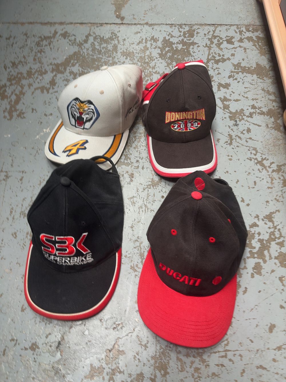 Lot 240: A Collection of Motorcycle Racing and Superbike World Championship Event Caps