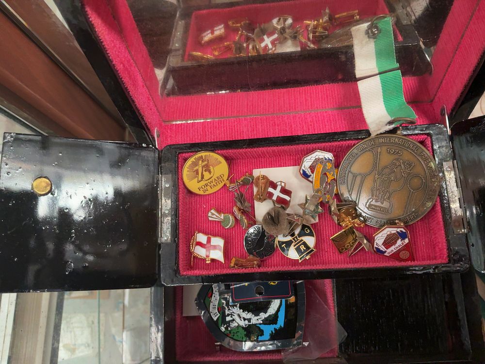Lot 273: A Collection of International Friendship League Memorabilia and Ephemera Including Medallion, Pins, and 1961 Goodwill Tour Documents