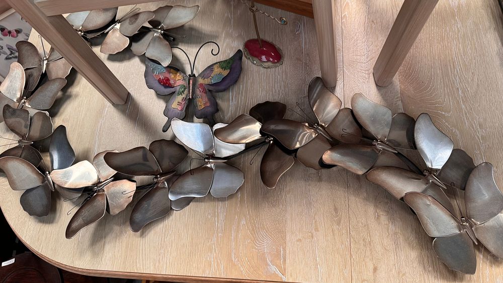 Lot 292: An Assortment of Butterfly-themed Decorative Items including Metal Wall Sculpture and Framed Art