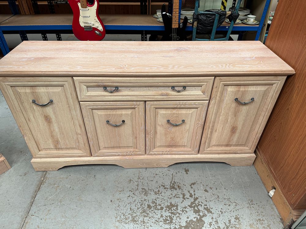 Lot 294: A Suite of Limed Oak Dining and Living Room Furniture in the French Provence Style