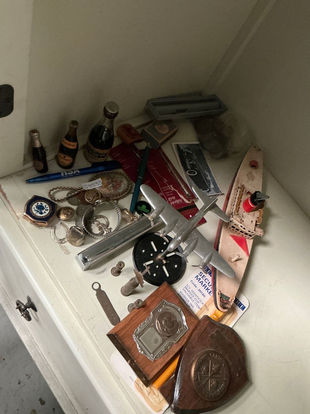 Lot 329: An Assortment of Vintage Collectables Including Ship and Aircraft Models, Prize Plaques, and Ephemera