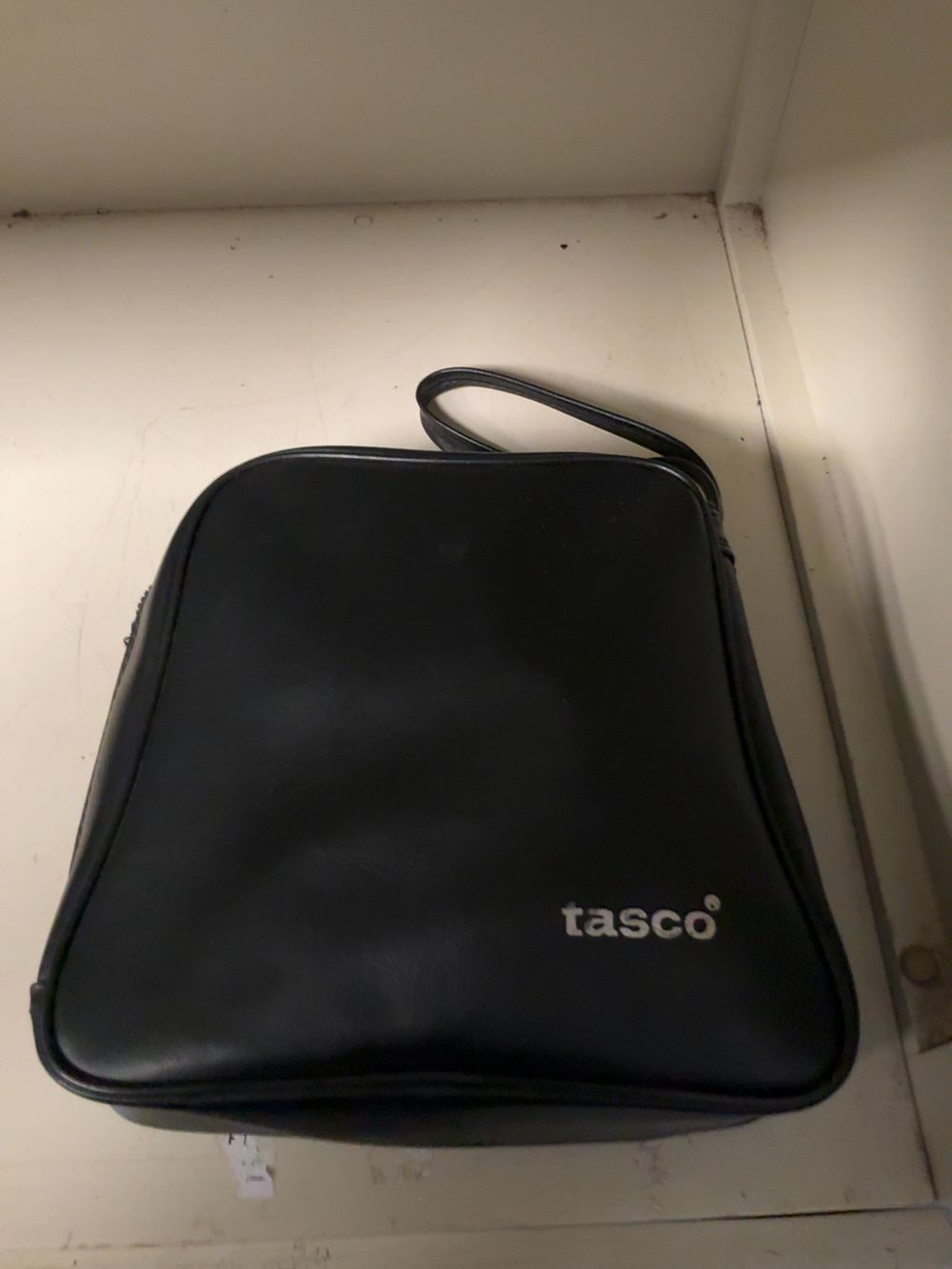 Lot 330: Tasco Model 312 10x50 Porro Prism Binoculars with Case and Filters