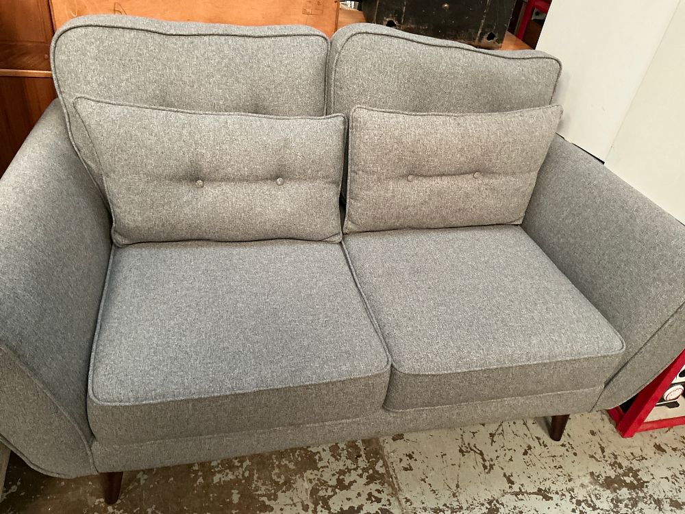 Lot 335: 2 DFS Mid-century Modern style two-seater sofas in grey textured fabric