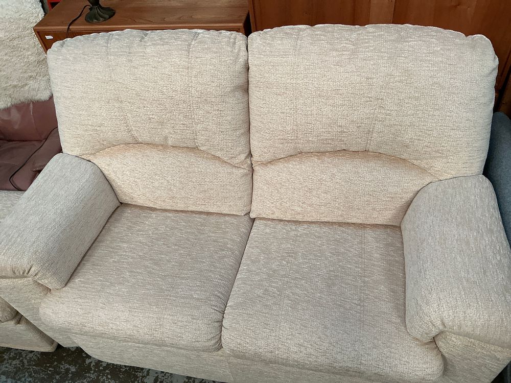 Lot 336: A G Plan Upholstery two-seater sofa and matching storage footstool