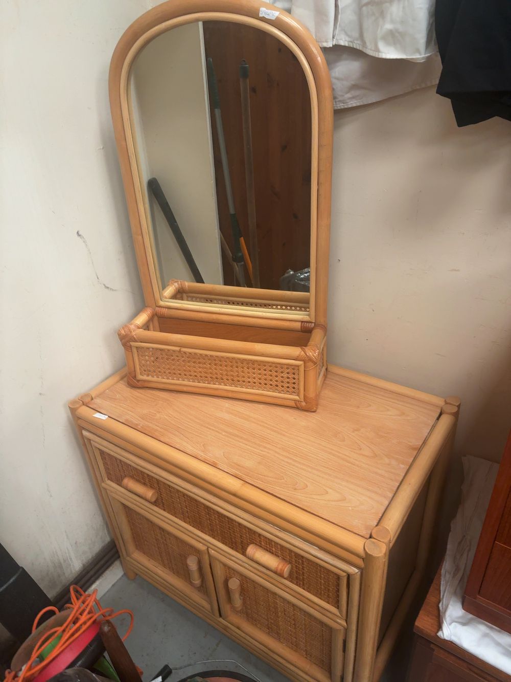 Lot 356: A Two-Piece Rattan and Cane Vanity Suite