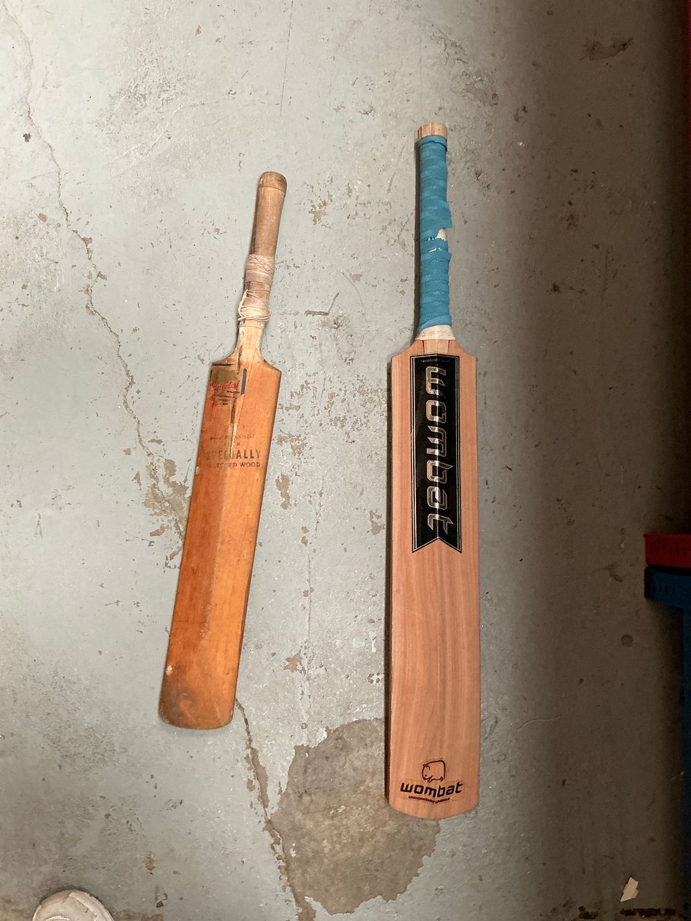 Lot 173: A Collection of Cricket Equipment Including a Wombat Cricket Bat, Vintage Junior Bat, and Stumps