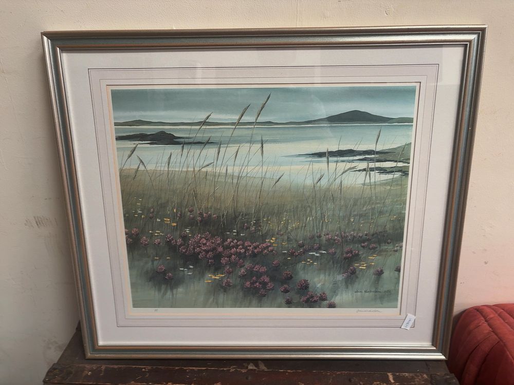 Lot 390: Print by Jim Nicholson (British, 20th Century), Coastal Landscape with Wildflowers, 1986