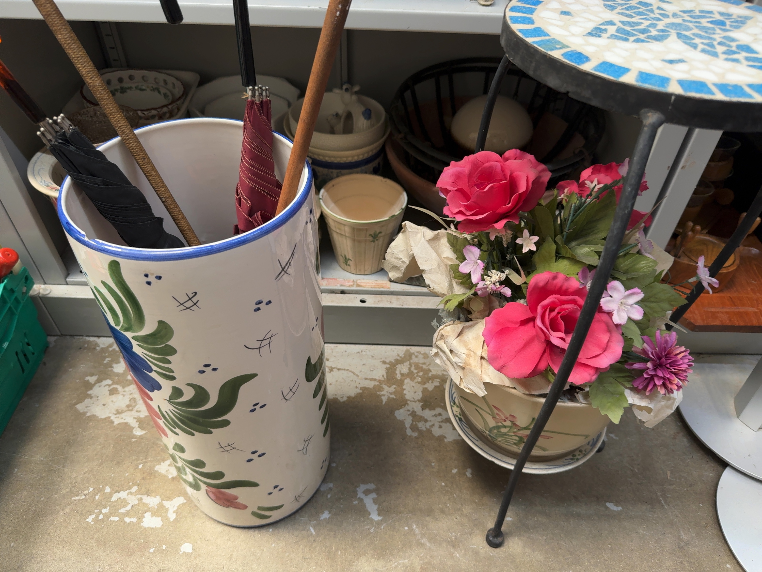 An Assortment of Ceramic Planters, a Mosaic-Topped Tiered Stand, and a Large Painted Ceramic Umbrella Stand