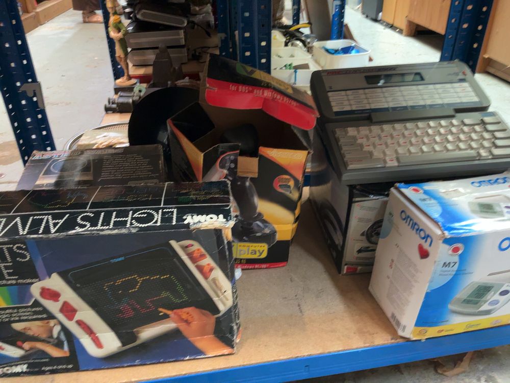 Lot 181: An Assortment of Vintage Electronic Toys, Games, and Peripherals Including Grandstand Astro Wars and Tomy Lights Alive