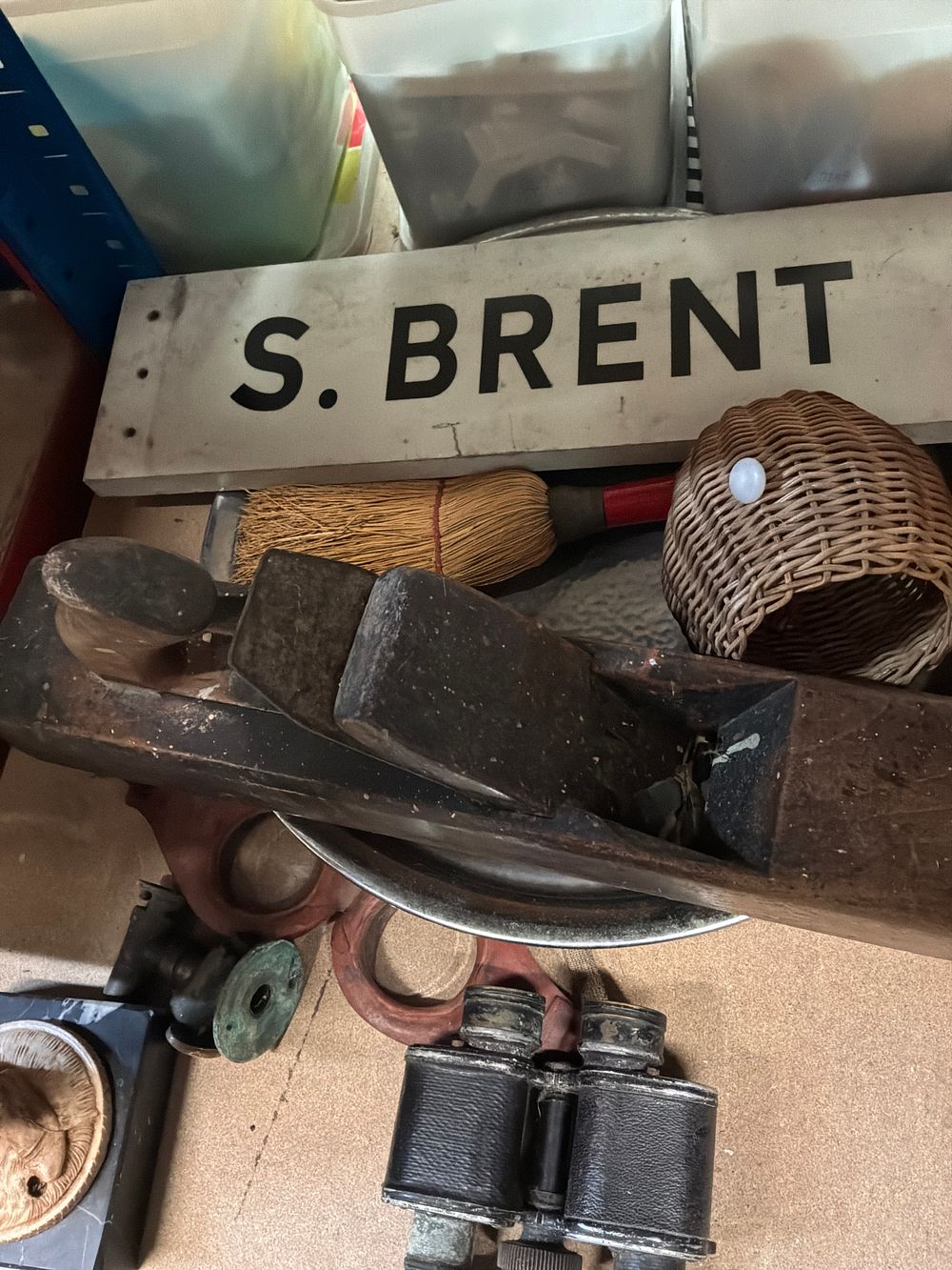 Lot 186: An Assortment of Vintage and Antique Collectables including a South Brent Sign and a Wooden Jointer Plane