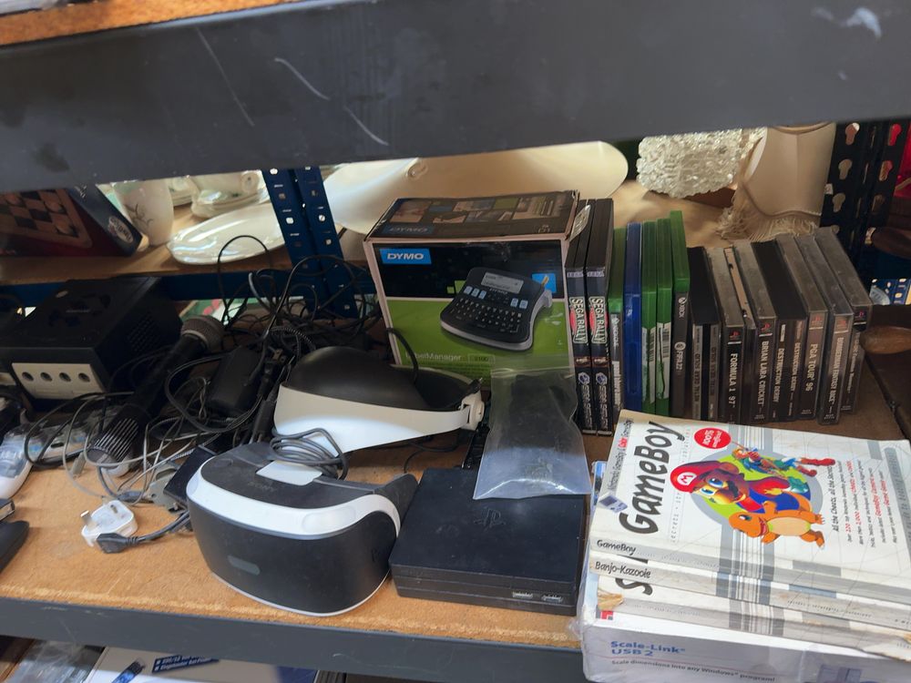 Lot 199: An Assortment of Vintage and Modern Gaming Consoles, Video Games, and Electronic Peripherals