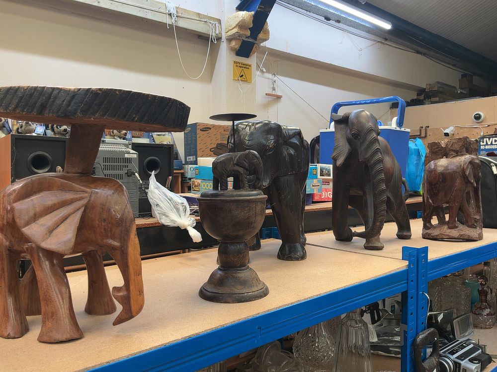 Lot 214: A Collection of Hand-Carved Hardwood Elephant-Themed Decorative Items