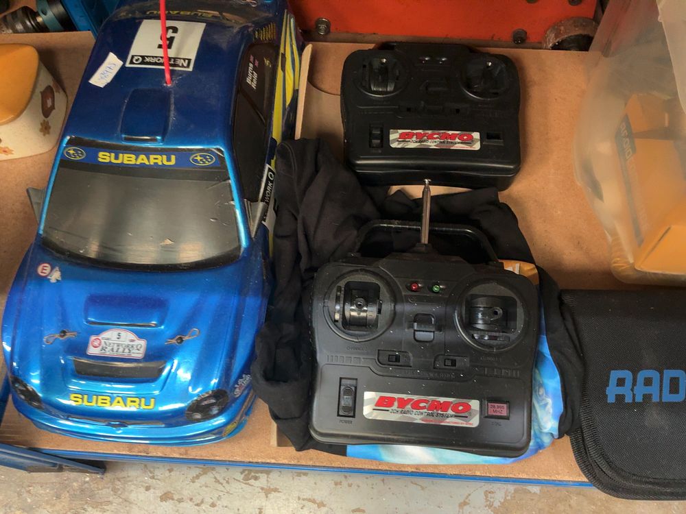 Lot 218: A Collection of Bycmo and DeAgostini Radio-Controlled Subaru Impreza WRC Model Car Components and Accessories