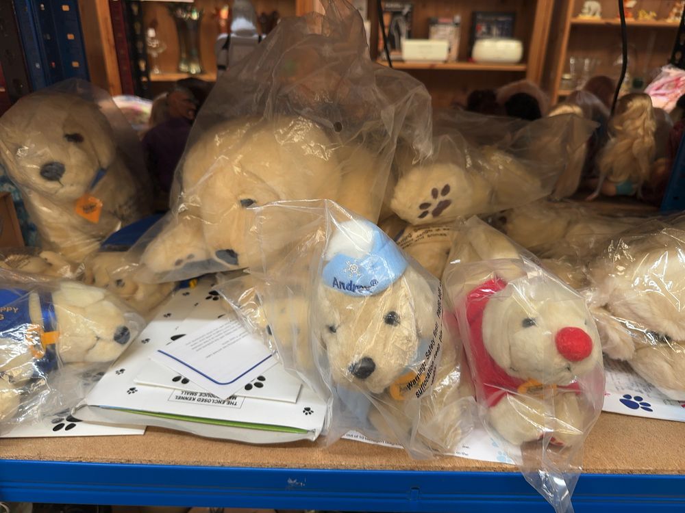 Lot 224: A Collection of Andrex Promotional Plush Puppy Toys and Accessories