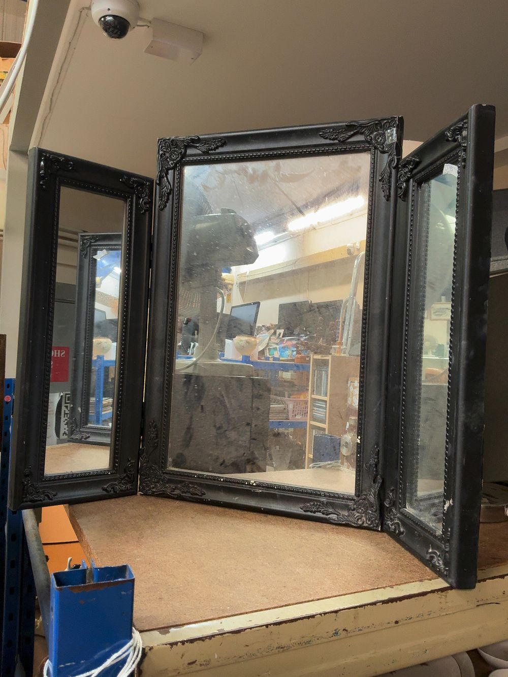 Lot 244: A Matt Black Rococo-revival Style Tri-fold Desk Mirror