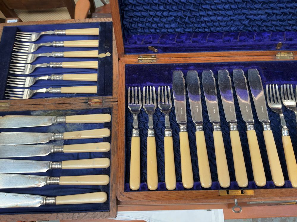Lot 254: Two Cased Sets of Late Victorian or Edwardian Silver-Plated Cutlery
