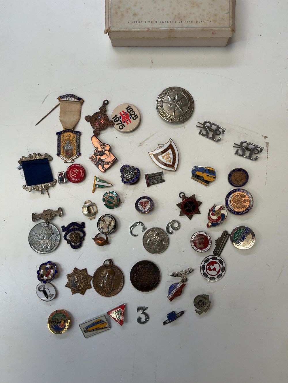 Lot 267: A Collection of Vintage British Commemorative Service Organisation and Transport Interest Badges and Medals