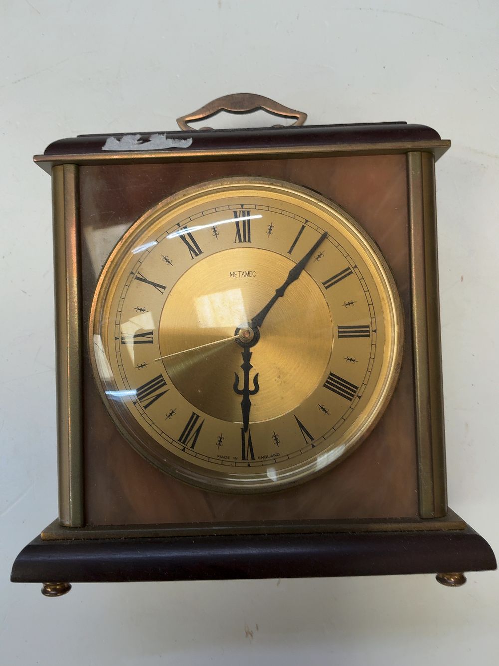 Lot 273: Metamec Wood and Brass Toned Mantel Clock with Kienzle Quartz Movement