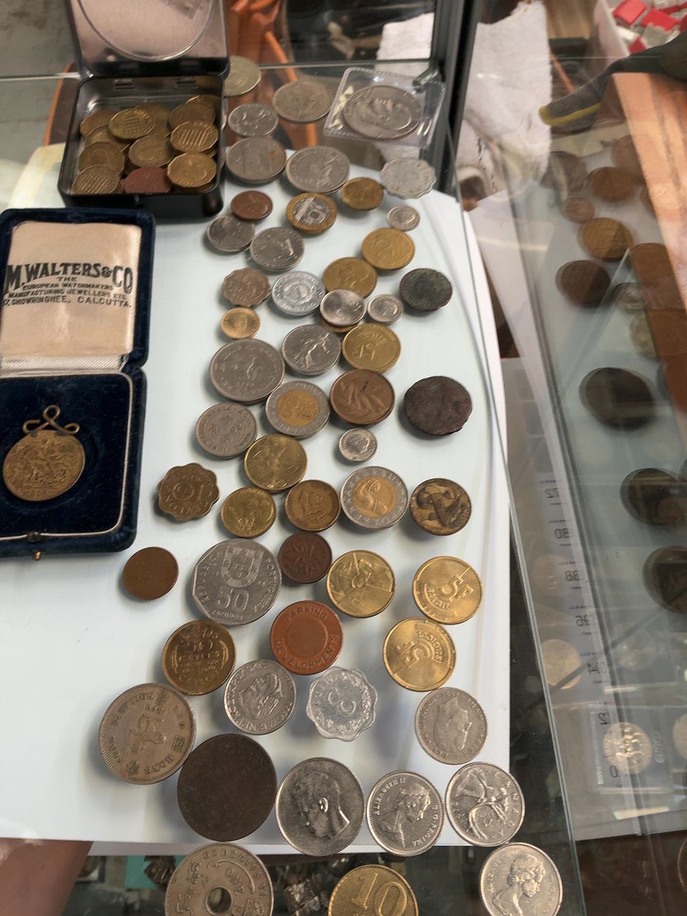 Lot 276: A Collection of World Coins and a  Cased Medal.