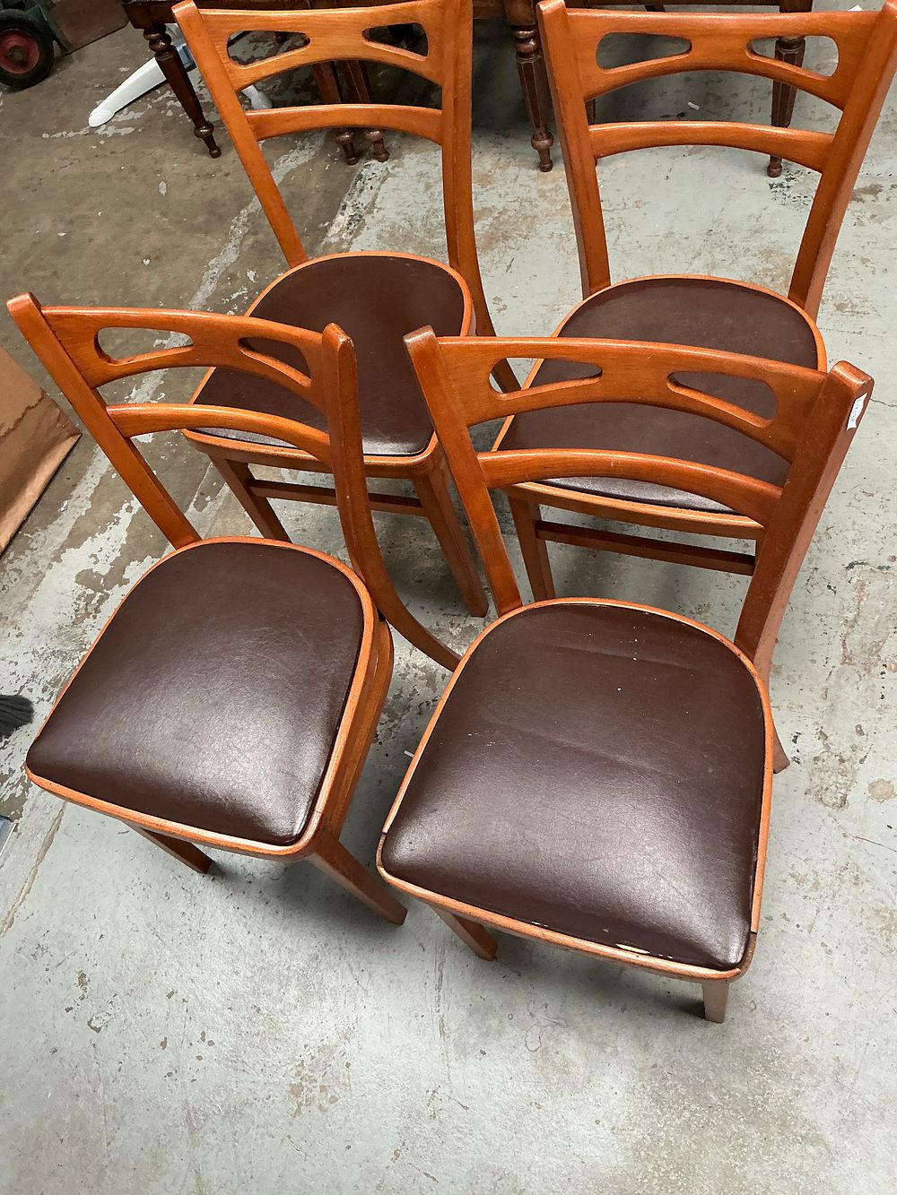 Lot 287: A Set of Four Mid-Century Modern Hardwood Dining Chairs