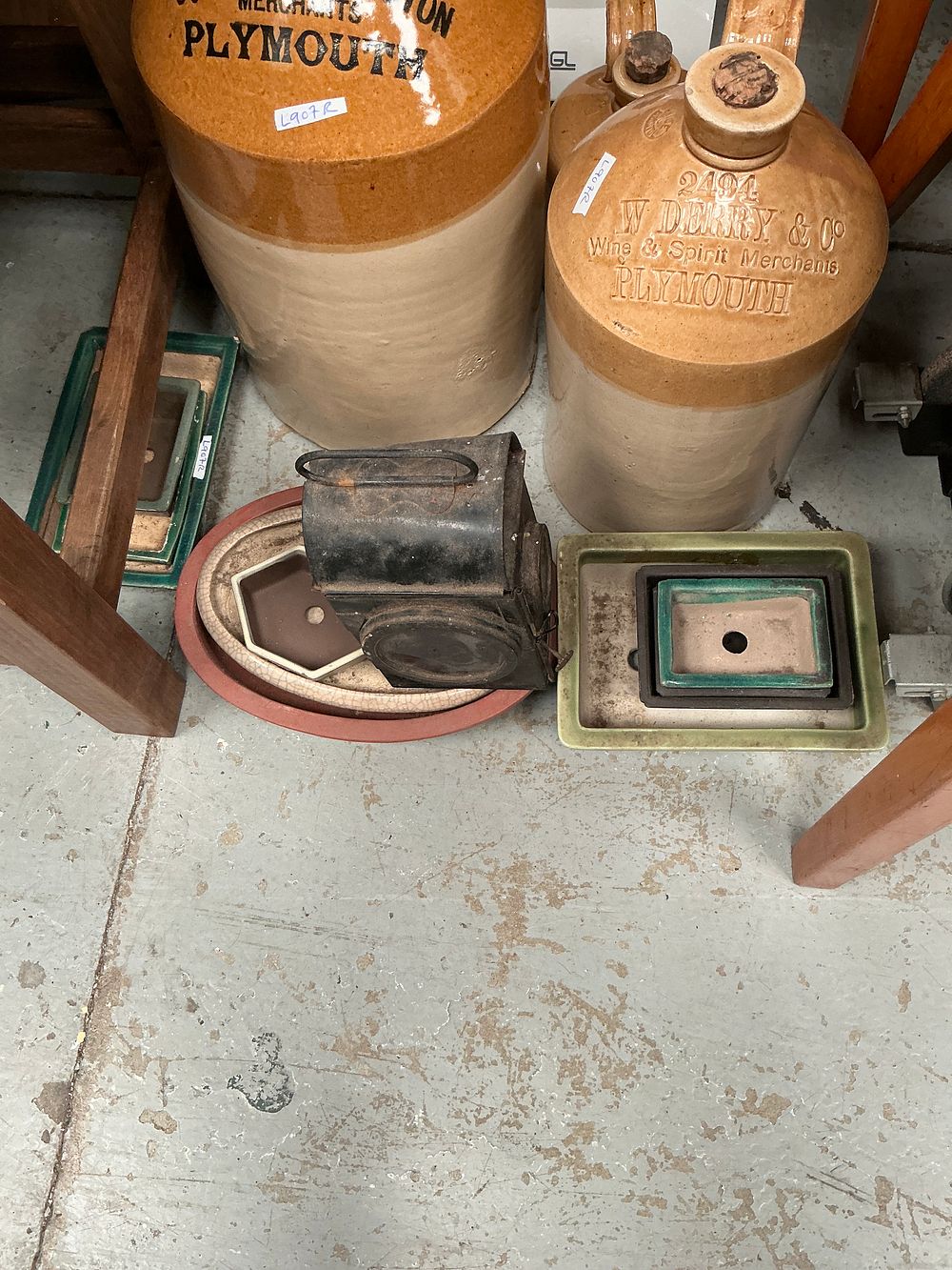 Lot 288: A Mixed Lot comprising Two Salt-Glazed Stoneware Advertising Spirit Jars, an Assortment of Bonsai Pots, a Vintage Lantern, and a  Walking Cane