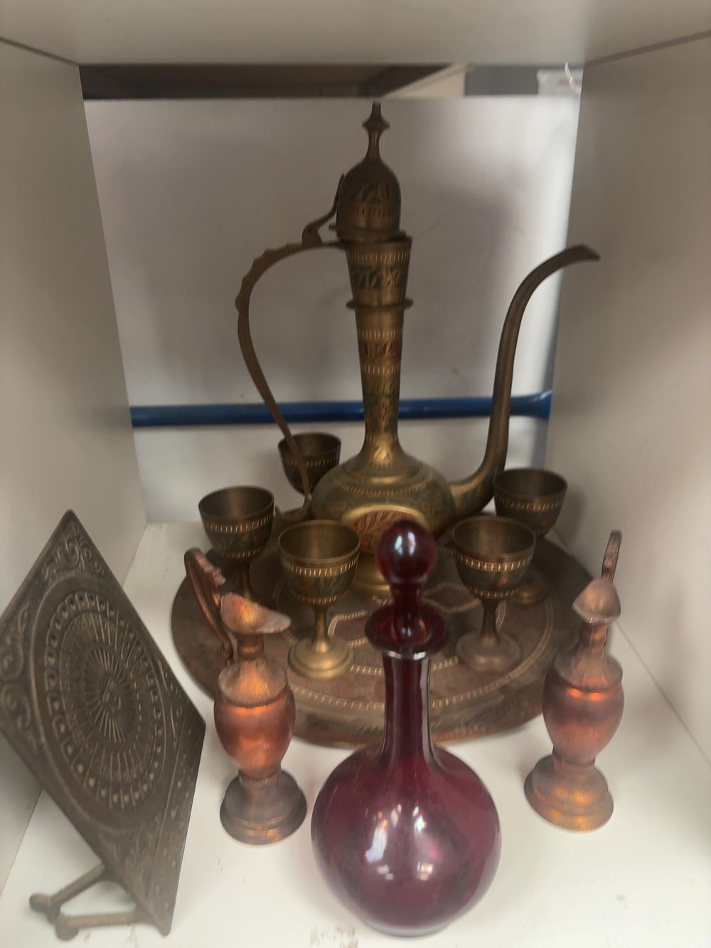Lot 318: A Group of Decorative Metalware and Glassware Including a Polychrome Brass Coffee Service and a Metal Perpetual Calendar
